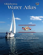 Photo of the Cover of the Oklahoma Water Atlas. Shows a sailboat on calm lake waters.